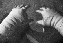 hands wrapped for business fights