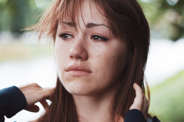 Girl cries regret