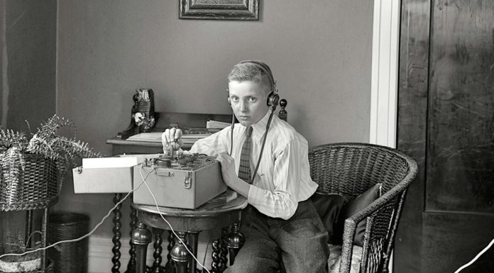 Boy with old telegraph