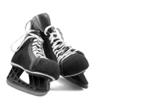 37557074 - black leather ice skates isolated on white skates