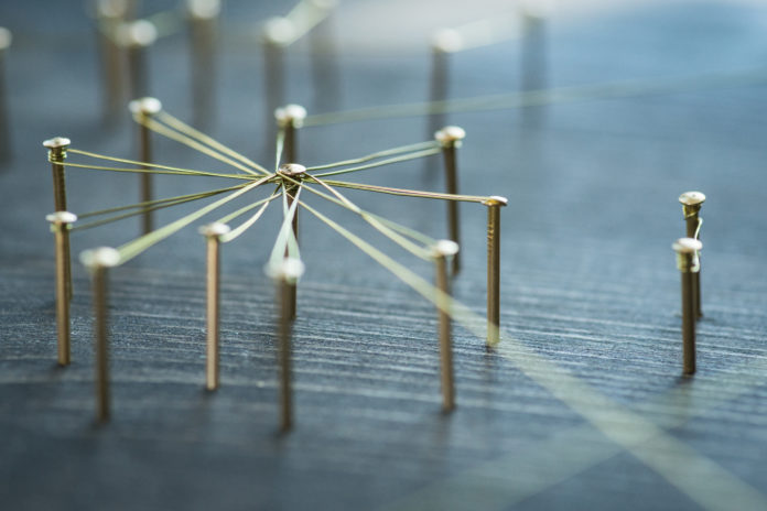 Web of wires, showing connections between groups and singles
