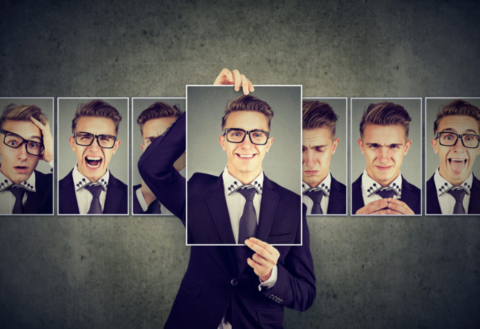 Positive masked man in glasses expressing different emotions